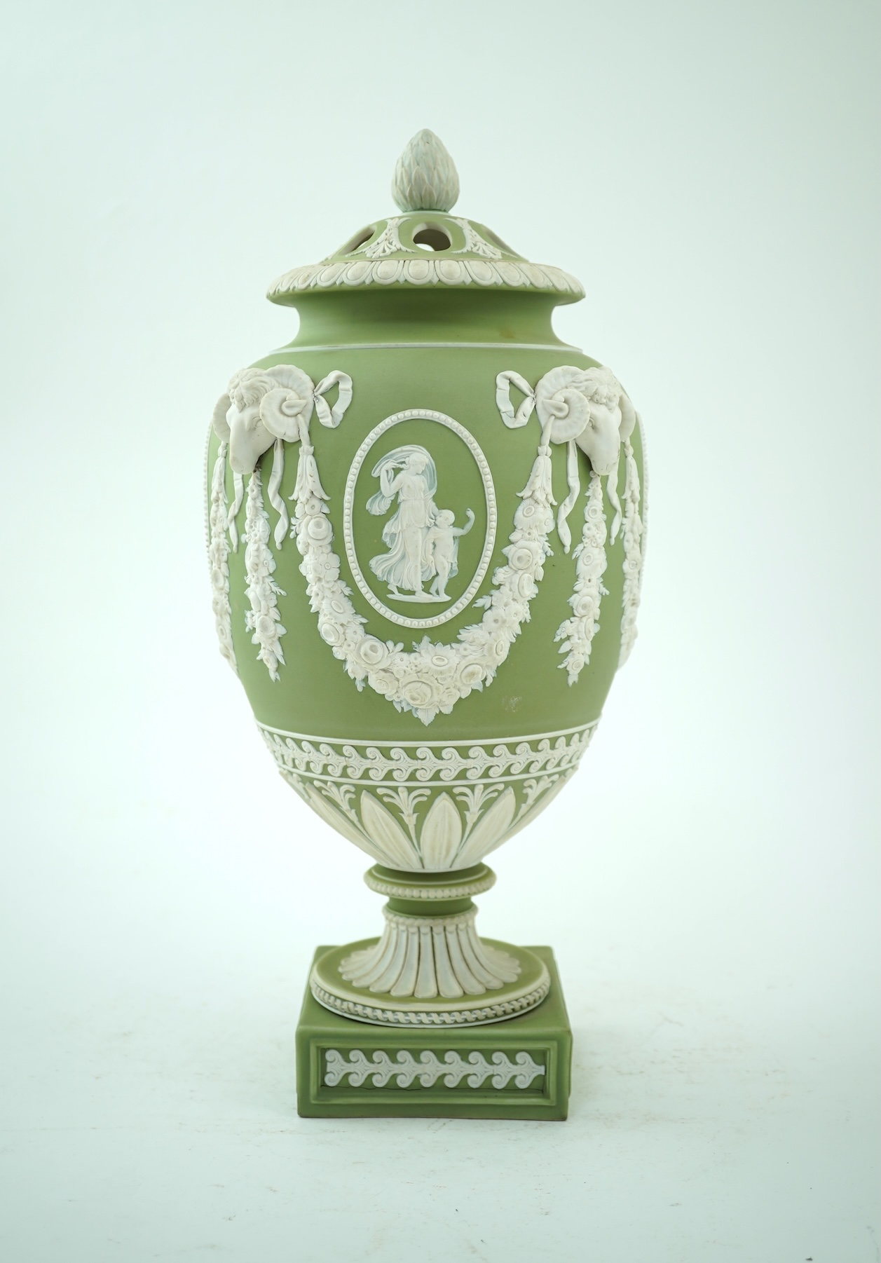 A Wedgwood green jasperware covered pot pourri urn, early 19th century